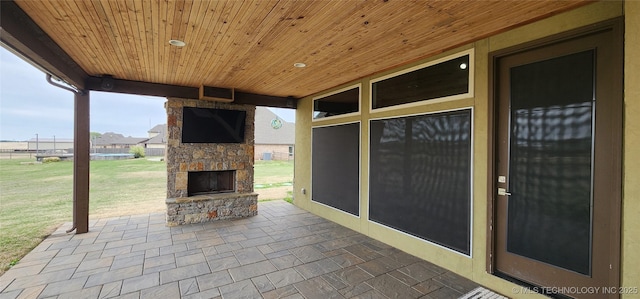 17078 S 11th W Ave, Glenpool, OK 74033 - view of patio with an outdoor stone fireplace