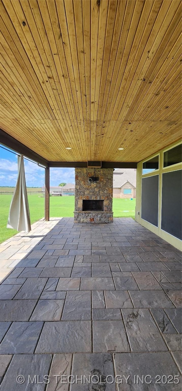 17078 S 11th W Ave, Glenpool, OK 74033 - view of patio featuring an outdoor stone fireplace