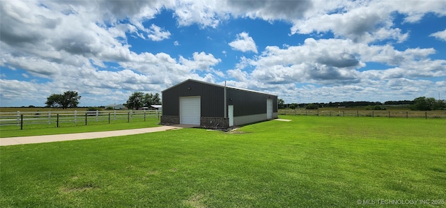 17078 S 11th W Ave, Glenpool, OK 74033 - view of yard with an outbuilding, a view of countryside, concrete driveway, and a detached garage