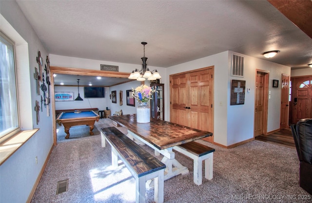 carpeted dining area with billiards, baseboards, a textured ceiling, and visible vents