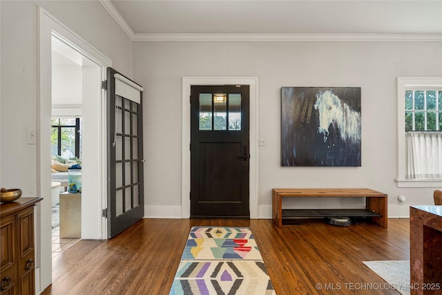 1225 E 18th St, Tulsa, OK 74120 - entrance foyer with wood finished floors, ornamental molding, and baseboards