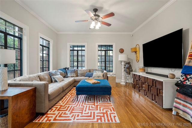 1225 E 18th St, Tulsa, OK 74120 - living area with wood finished floors, plenty of natural light, and ornamental molding