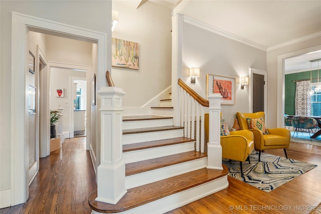 1225 E 18th St, Tulsa, OK 74120 - stairs featuring wood finished floors and crown molding