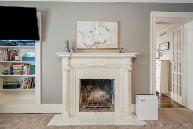 1225 E 18th St, Tulsa, OK 74120 - detailed view of carpet and a fireplace with flush hearth