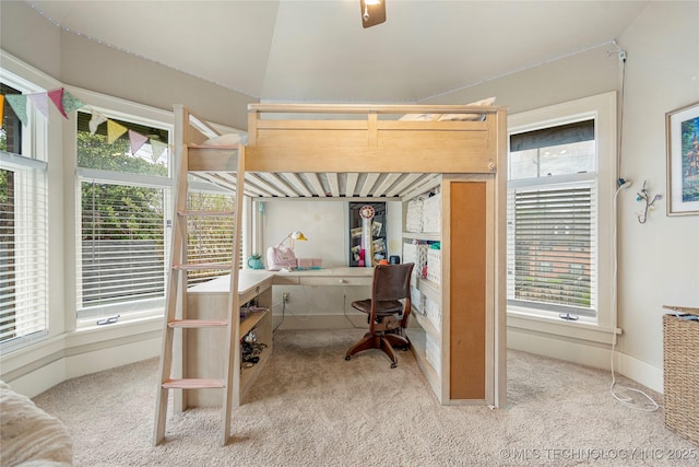 1225 E 18th St, Tulsa, OK 74120 - carpeted bedroom featuring an office area, multiple windows, lofted ceiling, and baseboards