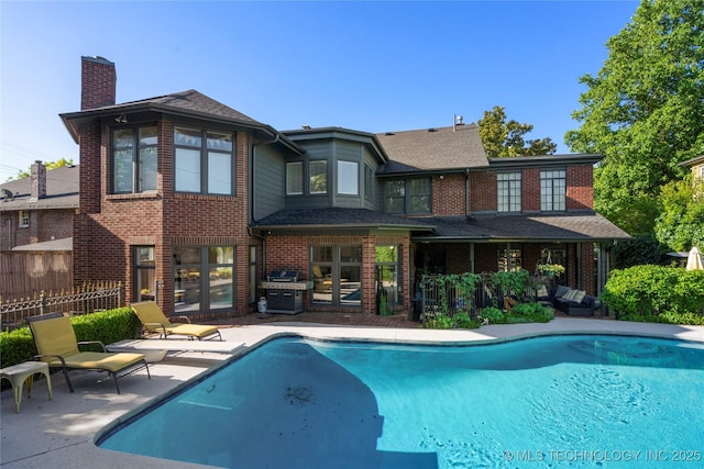 1225 E 18th St, Tulsa, OK 74120 - view of pool with a patio area and a grill