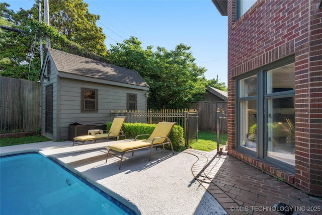 1225 E 18th St, Tulsa, OK 74120 - view of swimming pool with a patio area and an outdoor structure