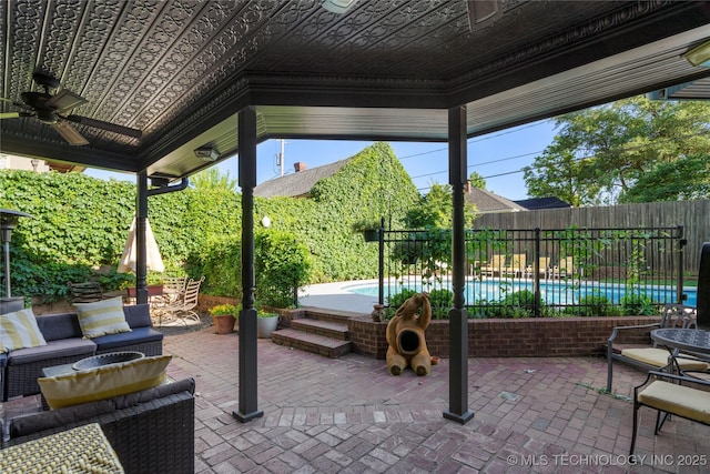 1225 E 18th St, Tulsa, OK 74120 - view of patio featuring ceiling fan