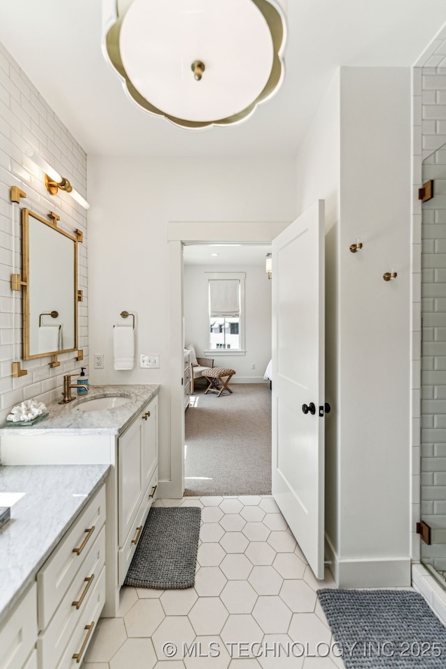 101 Lower Greenway, Carlton Landing, OK 74432 - full bath with vanity, baseboards, decorative backsplash, a shower stall, and ensuite bathroom