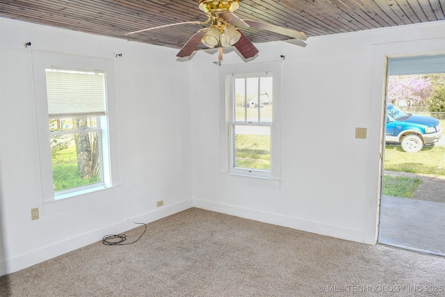 311 SW 4th St, Antlers, OK 74523 - unfurnished room featuring wooden ceiling, carpet, and baseboards