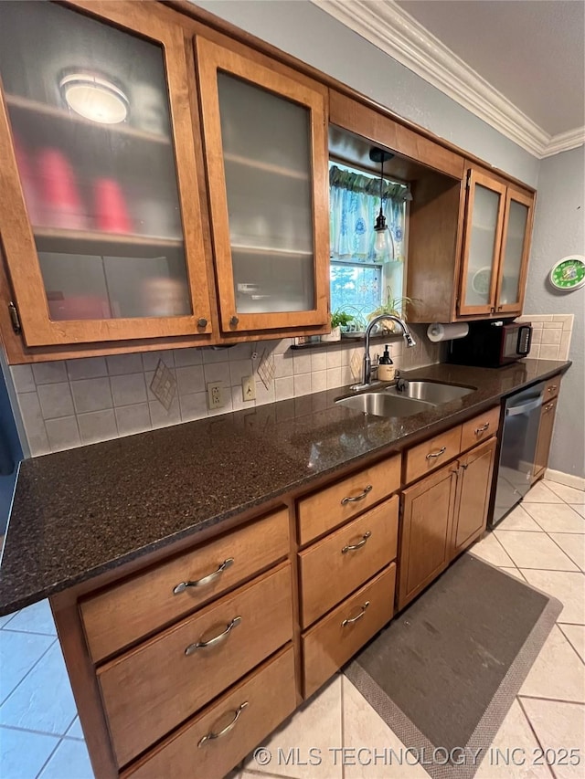 kitchen with stainless steel dishwasher, ornamental molding, a sink, light tile patterned flooring, and decorative backsplash