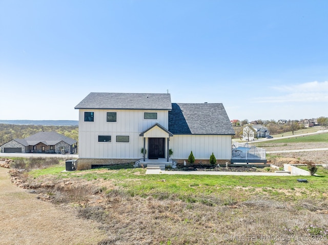 12255 Avalon Dr, Sperry, OK 74073 - modern farmhouse with a shingled roof and board and batten siding