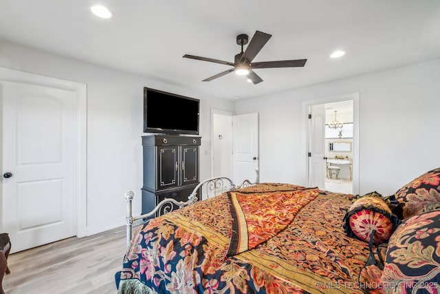 12255 Avalon Dr, Sperry, OK 74073 - bedroom with wood finished floors, recessed lighting, ensuite bathroom, and a ceiling fan