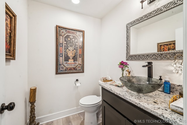 12255 Avalon Dr, Sperry, OK 74073 - half bath with wood finished floors and vanity