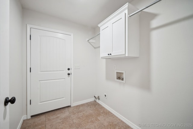 laundry room featuring baseboards, gas dryer hookup, light tile patterned flooring, hookup for a washing machine, and cabinet space