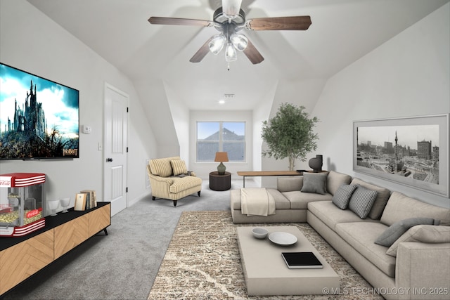 living area featuring ceiling fan, carpet flooring, and baseboards