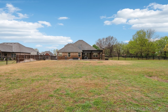 view of yard featuring a fenced backyard and a patio