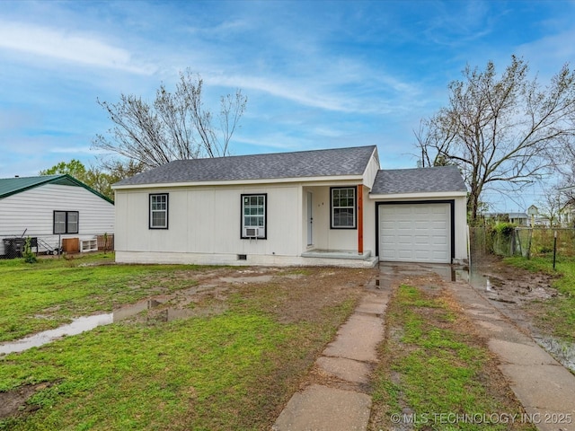view of front facade featuring fence, an attached garage, concrete driveway, crawl space, and roof with shingles