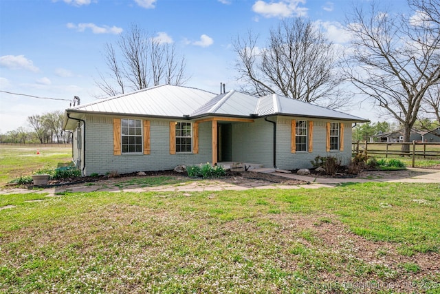9839 N Lewis Ave, Sperry, OK 74073 - ranch-style home with fence, a front lawn, and brick siding