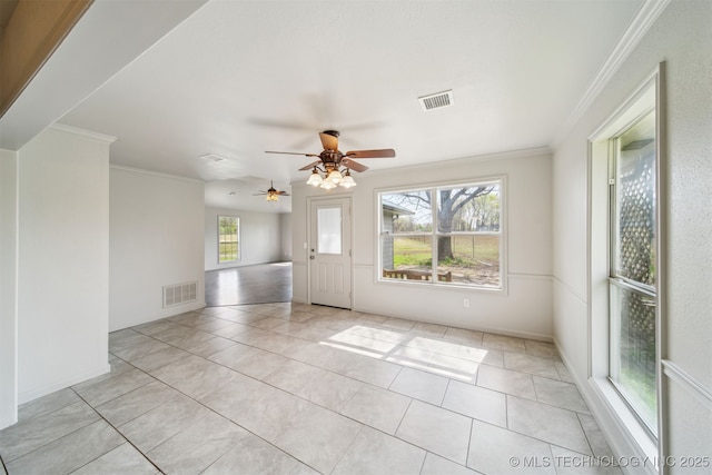 9839 N Lewis Ave, Sperry, OK 74073 - spare room featuring visible vents, crown molding, and ceiling fan