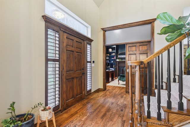 626 Countrywood Way, Sapulpa, OK 74066 - entrance foyer with stairs, wood finished floors, and a towering ceiling