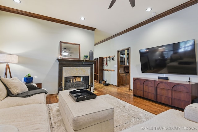 626 Countrywood Way, Sapulpa, OK 74066 - living room with ceiling fan, ornamental molding, recessed lighting, a high end fireplace, and wood finished floors