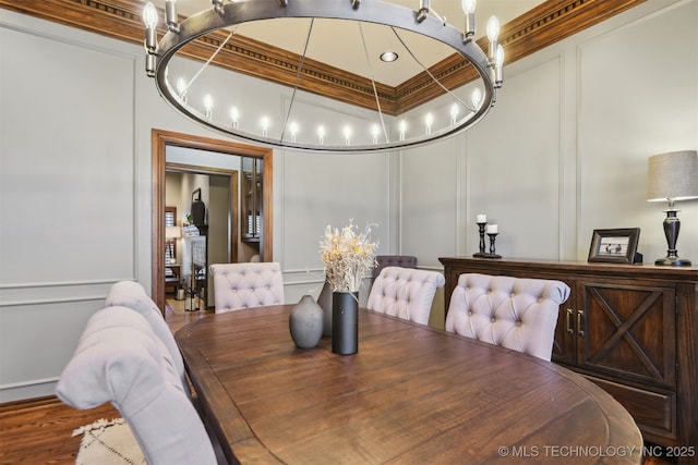 626 Countrywood Way, Sapulpa, OK 74066 - dining room with a decorative wall, crown molding, and a chandelier