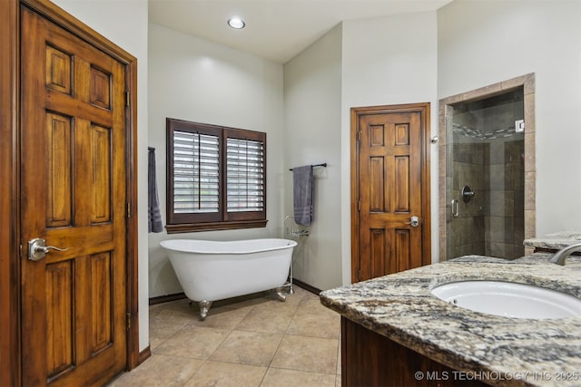 626 Countrywood Way, Sapulpa, OK 74066 - full bath featuring a freestanding tub, a shower stall, vanity, and tile patterned floors