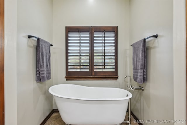 626 Countrywood Way, Sapulpa, OK 74066 - bathroom with a freestanding bath