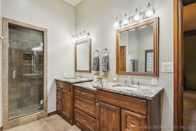 626 Countrywood Way, Sapulpa, OK 74066 - bathroom with double vanity, a shower stall, and tile patterned flooring