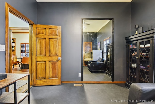 626 Countrywood Way, Sapulpa, OK 74066 - interior space with concrete floors and crown molding