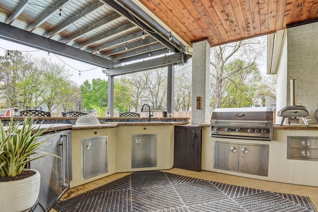 626 Countrywood Way, Sapulpa, OK 74066 - view of patio / terrace featuring exterior kitchen and a sink