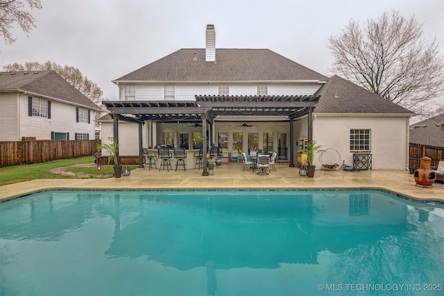 626 Countrywood Way, Sapulpa, OK 74066 - view of swimming pool with a fenced backyard, a pergola, ceiling fan, and a patio area