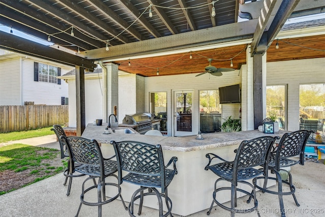 626 Countrywood Way, Sapulpa, OK 74066 - view of patio featuring exterior kitchen and a ceiling fan