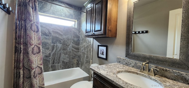 bathroom featuring shower / bath combo with shower curtain, vanity, and toilet