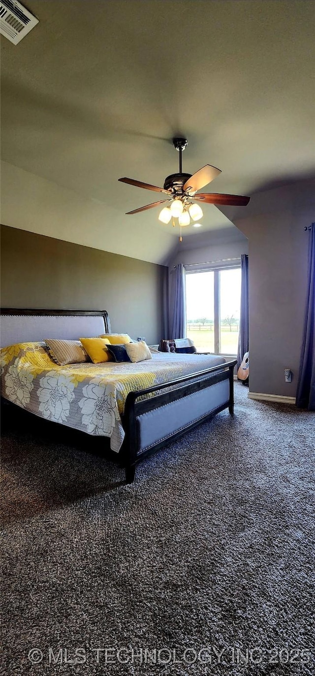 carpeted bedroom with baseboards, a ceiling fan, and visible vents