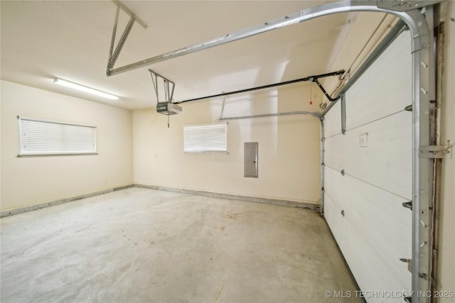 6673 E 60th Pl, Tulsa, OK 74145 - garage with a garage door opener and electric panel