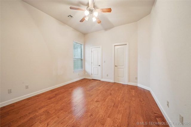 6673 E 60th Pl, Tulsa, OK 74145 - spare room with a ceiling fan, light wood-style floors, and baseboards