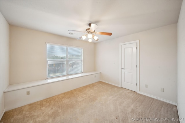 6673 E 60th Pl, Tulsa, OK 74145 - carpeted spare room with ceiling fan and baseboards