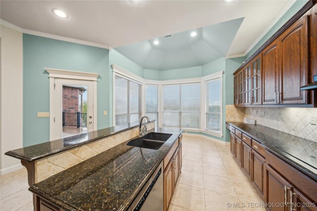 6673 E 60th Pl, Tulsa, OK 74145 - kitchen with stainless steel dishwasher, a sink, decorative backsplash, light tile patterned flooring, and glass insert cabinets