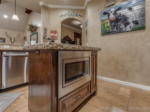 interior space featuring light stone counters, stone tile flooring, stainless steel appliances, baseboards, and ornamental molding