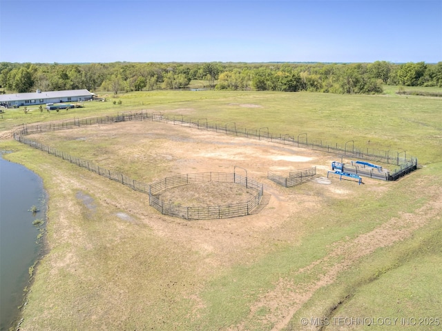 aerial view with a rural view and a water view