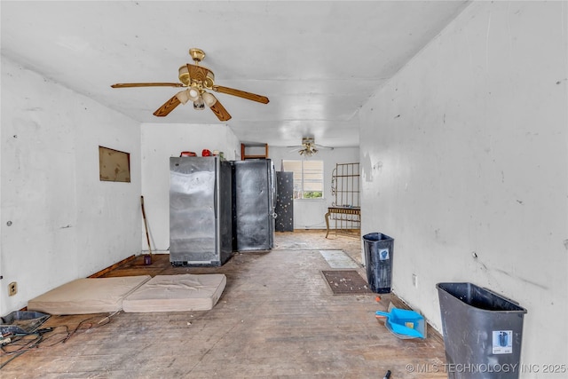 interior space featuring a ceiling fan