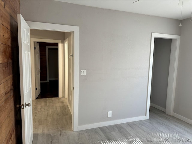 218 SW B, Ardmore, OK 73401 - spare room featuring light wood-style floors and baseboards