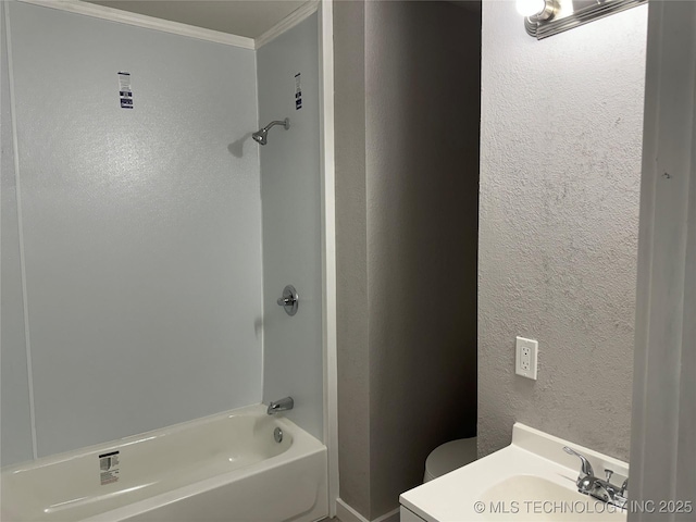 218 SW B, Ardmore, OK 73401 - bathroom with crown molding,  shower combination, vanity, and a textured wall