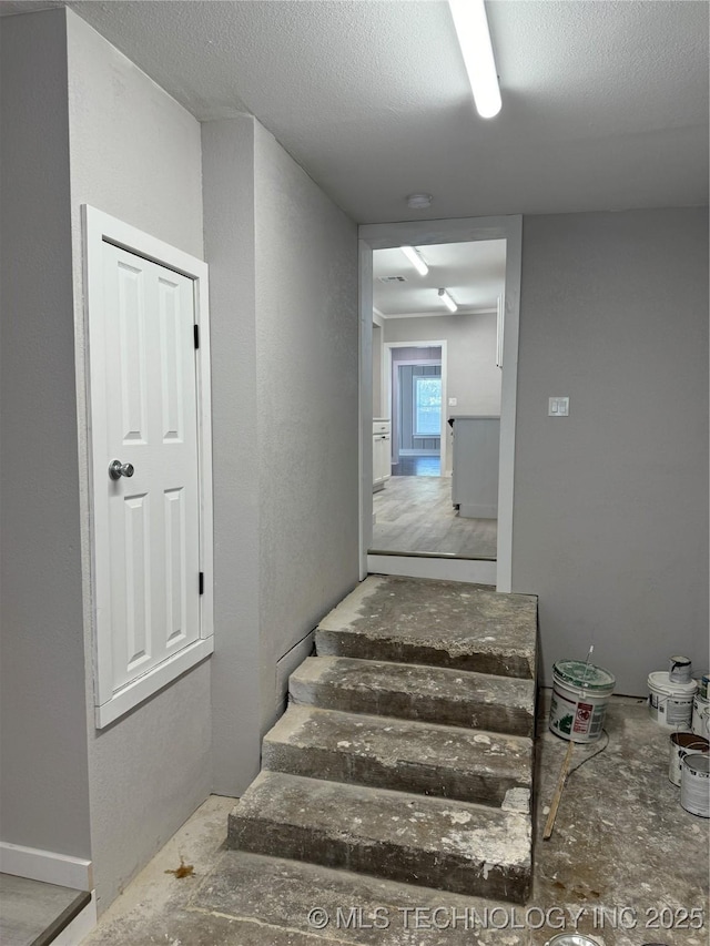 218 SW B, Ardmore, OK 73401 - stairway with a textured ceiling