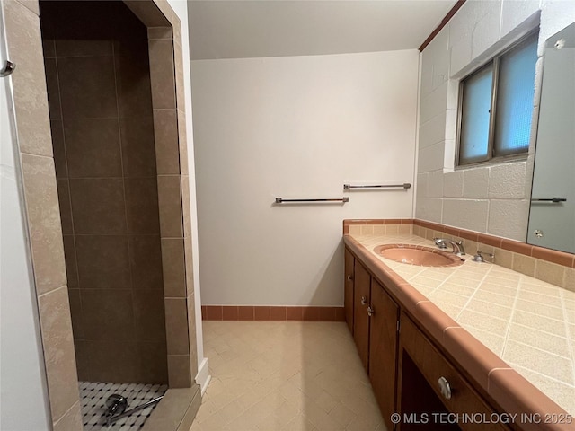1421 E 50th St S, Tulsa, OK 74105 - full bath featuring vanity, tiled shower, and tile patterned flooring
