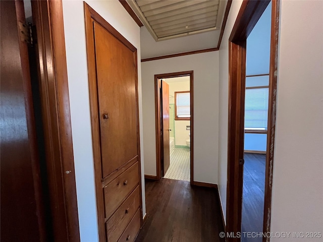 1421 E 50th St S, Tulsa, OK 74105 - hallway featuring dark wood-style floors and baseboards