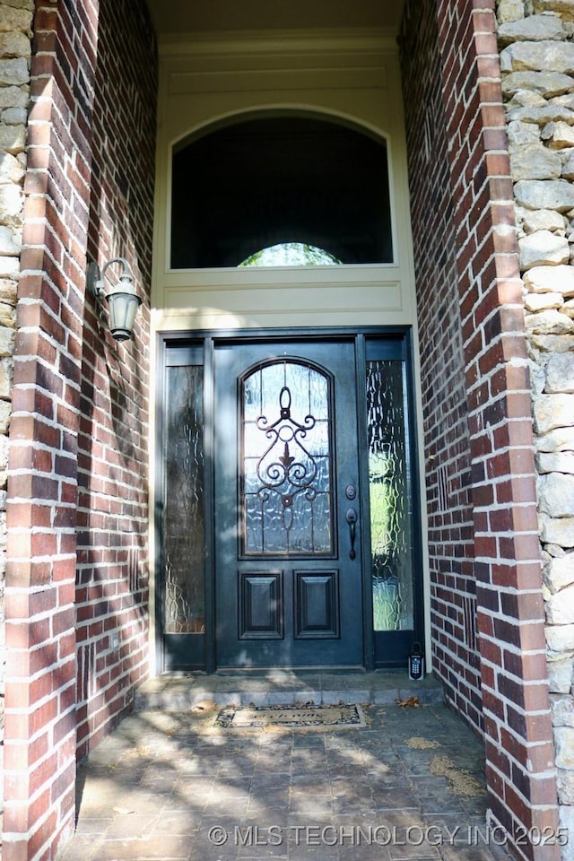 10213 S 88th E Ave, Tulsa, OK 74133 - property entrance with brick siding
