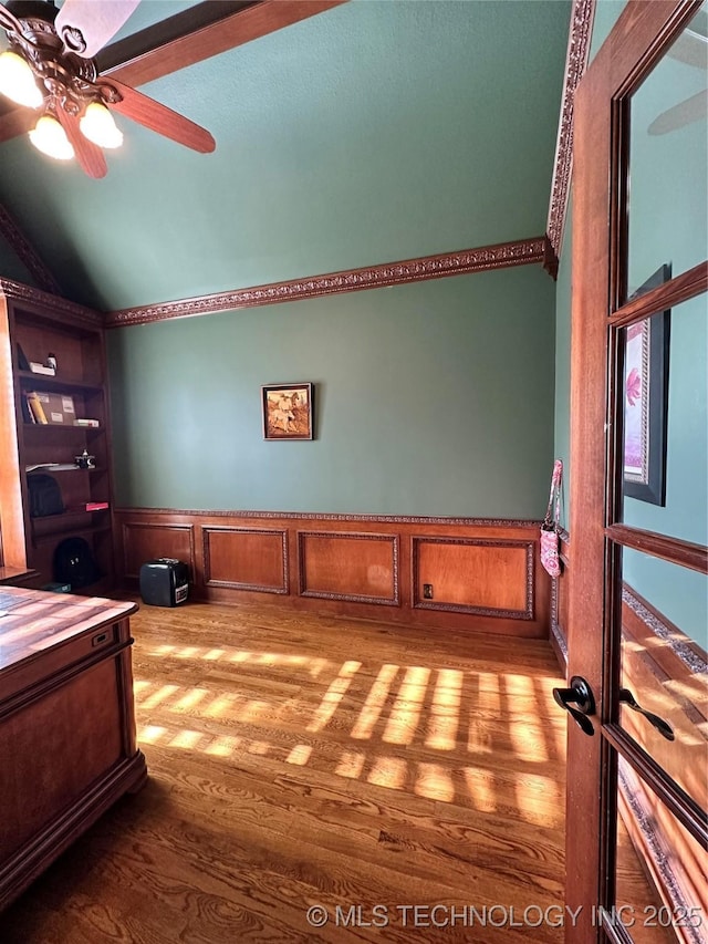 10213 S 88th E Ave, Tulsa, OK 74133 - office space featuring lofted ceiling, wood finished floors, a ceiling fan, and a wainscoted wall